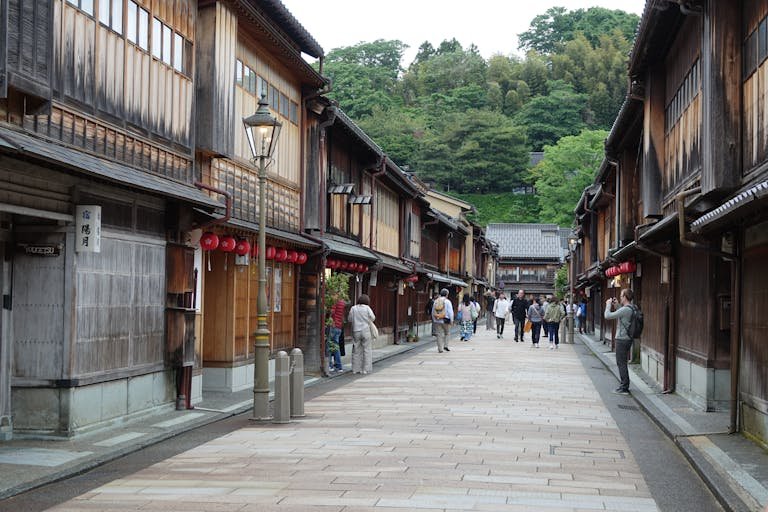 Explore the historic charm of Kanazawa's Higashi Chaya District with its classic wooden architecture.